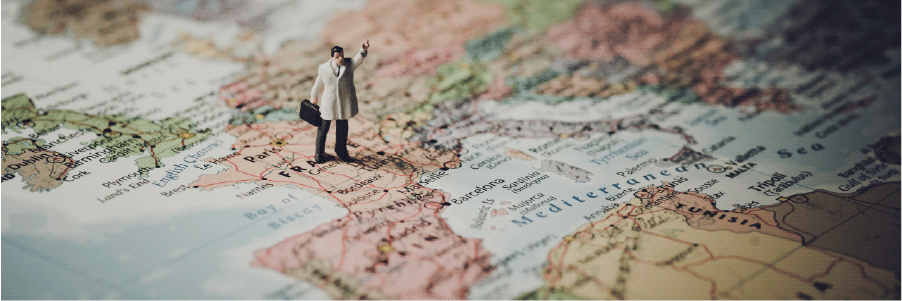 Miniature man on France map